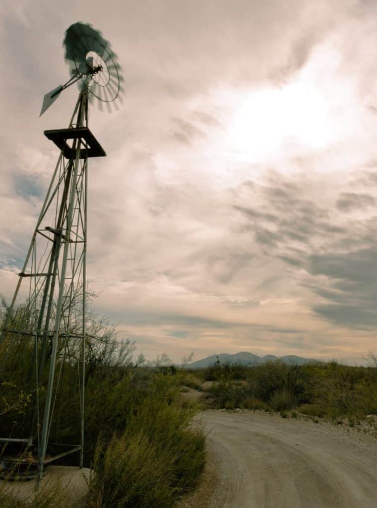 Windmill water pump desert storm forming